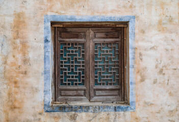 old window with shutters