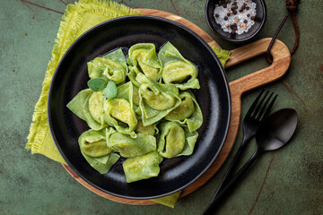 Top view of Tortelloni  or tortelli Balanzoni - italian green pasta with Spinach and Ricotta cheese...