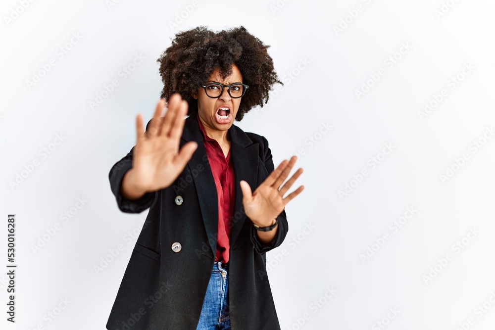 Sticker african american woman with afro hair wearing business jacket and glasses afraid and terrified with 