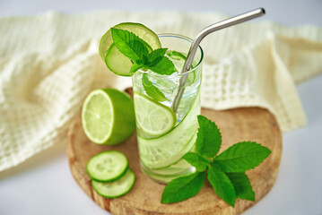 Cucumber, lime and mint lemonade. Refresment summer drink, Glass of detox water for dieting