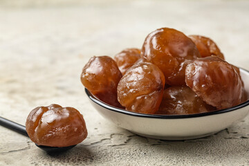 Chestnut candied sugar syrup and glazed or marron glacé,  confection, originating in northern...