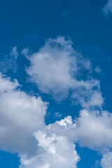 Obraz premium White clouds in the blue sky.
