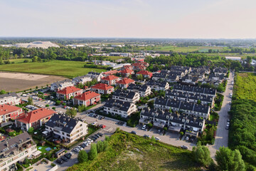 Aerial view of suburban neighborhood, Residential district with houses and streets in small european town