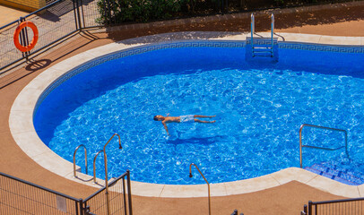 Child in the swimming pool