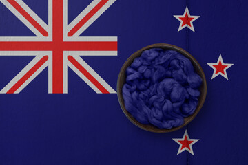 Wooden basket on background in colors of national flag. Photography and marketing digital backdrop. New Zealand
