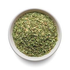 Dried oregano seasoning in round bowl isolated on white. Top view. - obrazy, fototapety, plakaty