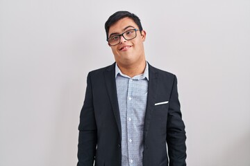 Young hispanic man with down syndrome wearing business style winking looking at the camera with...
