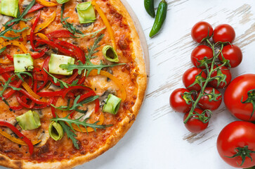 Classic italian vegetarian pizza in white wooden desk.Top view