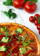 Classic italian vegetarian pizza in white wooden desk.Top view