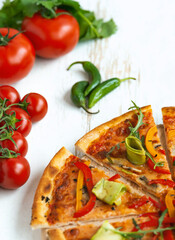 Classic italian vegetarian pizza in white wooden desk.Top view