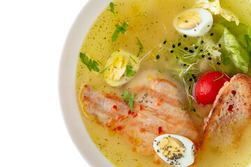 Fragrant first coursefrom chicken broth, quail eggs and poultry meat. Dietary cream soup based on baked and fresh vegetables with herbs. Fitness menu. Delivery of prepared food. White backgr