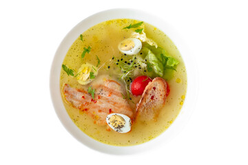Fragrant first coursefrom chicken broth, quail eggs and poultry meat. Dietary cream soup based on baked and fresh vegetables with herbs. Fitness menu. Delivery of prepared food. White backgr
