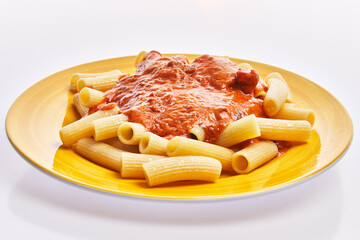  Plate of italian rigatoni pasta with tomato sauce over white isolated background