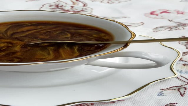 cup of coffee with spoon