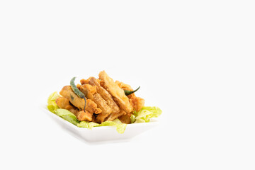 Indian Street Food Sliced Crispy Fried Potato Wedges Also Called Aloo Bhajji, Alu Bajji, Aaloo Pakoda or Pakora Made Of Bengal Gram Flour Besan Coating Are Famous Tea Time Evening Time Appetizer