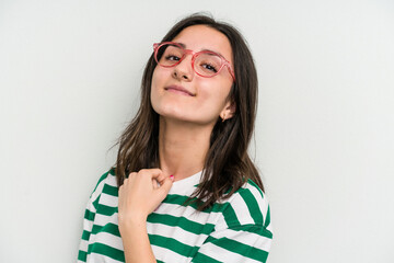 Fototapeta premium Young caucasian woman wearing a glasses isolated on blue background