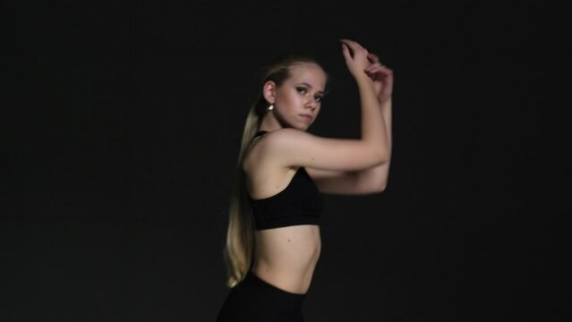 Energetic Young Woman Choreographer Dancing in Studio 