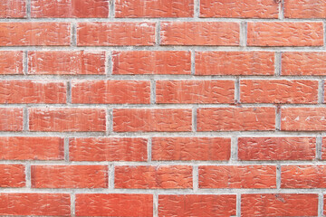 Obraz premium Brick wall texture with cracked tiles and cement. Classic brickwall surface background