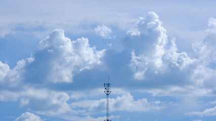 Aerial view of the antenna on the sky background. Technology and communication concept.
