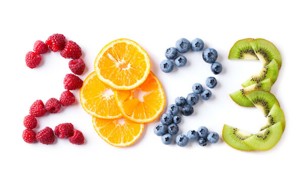 Mixed fruits. New year 2023 made of fruits on the white background. Healthy food