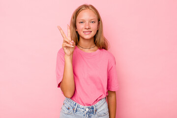 Caucasian teen girl isolated on pink background showing number two with fingers.