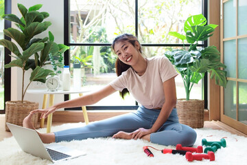 The asian woman do yoga at home in holiday time, on modern concept and healthy. White background...