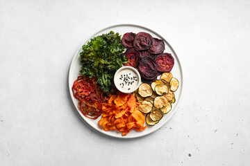 Dried vegetables chips from beets, carrots, zucchini, kale, tomatoes, top view