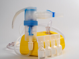 Medical equipment for inhalation, nebulizer on a white background.