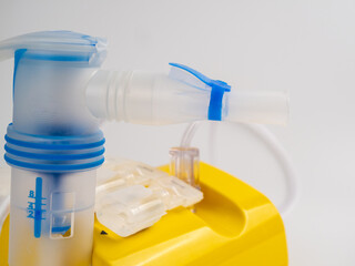 Medical equipment for inhalation, nebulizer on a white background.