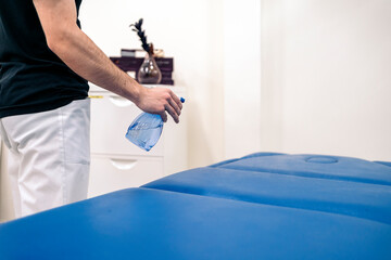 Disinfecting Stretcher in Clinic