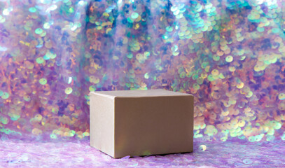 Beautiful iridescent purple color sequins textile background with square shape box pedestal for...