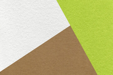 Texture of craft white, green and brown shade color paper background, macro. Structure of vintage abstract cardboard