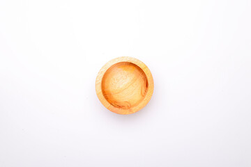 round wooden bowl isolated on white background