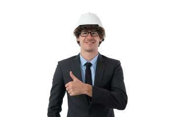 Portrait of Smiling young business man in black suit protective construction helmet showing thumbs up isolated on white background.