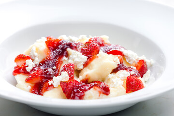 sweet gnocchi served with fresh strawberries and cottage cheese