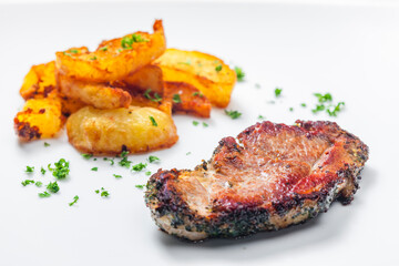 pork steak with fried potatoes
