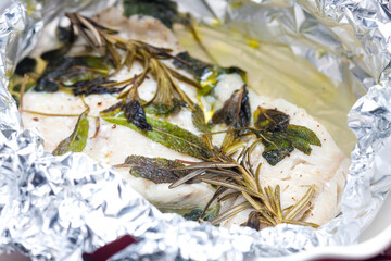 white fish fillet baked with herbs