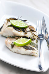 white fish fillet baked with herbs