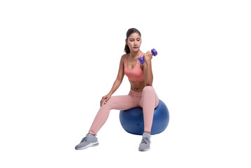 Fototapeta premium Full size shot of young sporty Asian woman fitness model in pink-top sportswear doing exercises with dumbbells sitting on big ball. isolated on white background. Fitness and healthy lifestyle concept.
