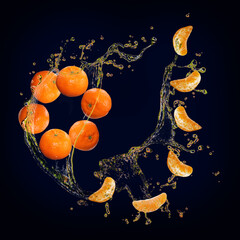 Obraz na płótnie Canvas Juicy tasty tangerine with splashes of juice background for designers