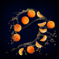 Fototapeta na wymiar Juicy tasty tangerine with splashes of juice is very healthy