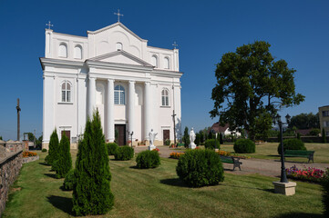 Fototapeta na wymiar Old ancient catholic church of Saints Cosmas and Damian in Ostrovets city, Grodno region, Belarus.