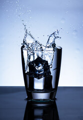 The image of pouring drinking water, into a glass,