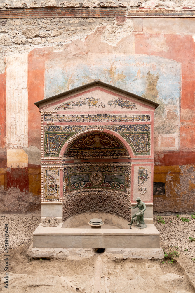 Wall mural Small worship site inside ancient roman house in Pompeii