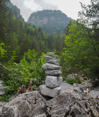 stone tower in deep forest