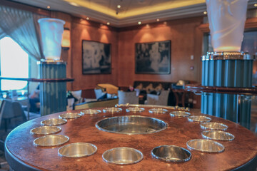 Elegant Art Deco interior design furnishing bar lounge area onboard ocean liner cruiseship cruise...