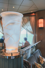 Elegant Art Deco interior design furnishing bar lounge area onboard ocean liner cruiseship cruise...