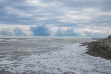 waves breaking on the beach