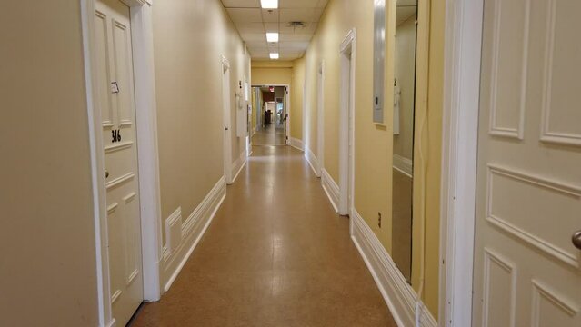 Hallway with residence rooms for students to live in and pursue their studies. Wycliffe College, University of Toronto. 