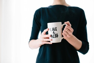 person holding a cup of coffee